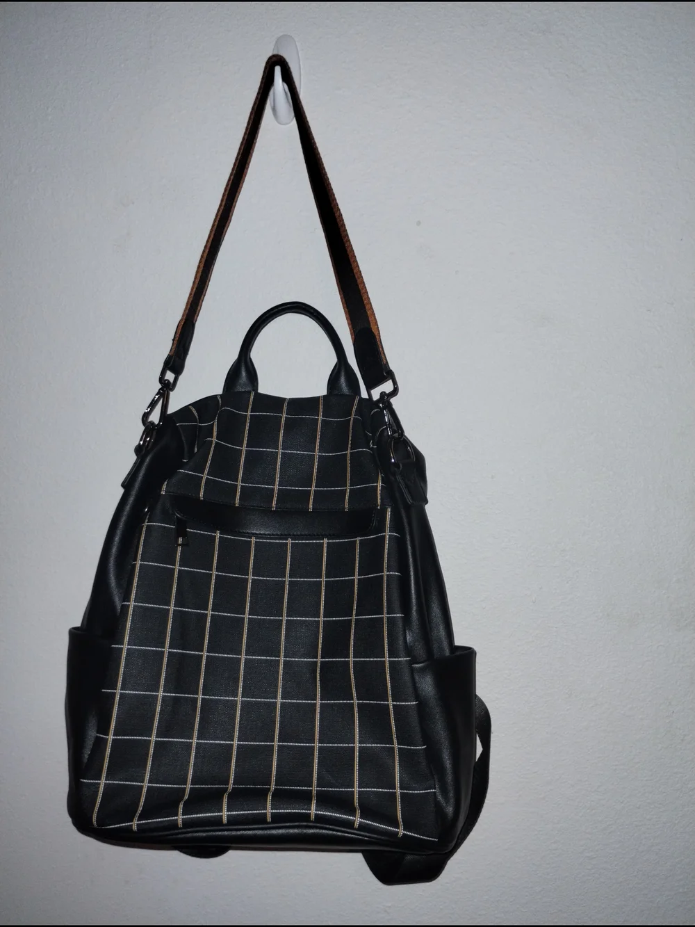 Black Grid-Pattern Backpack with Contrast Brown Strap